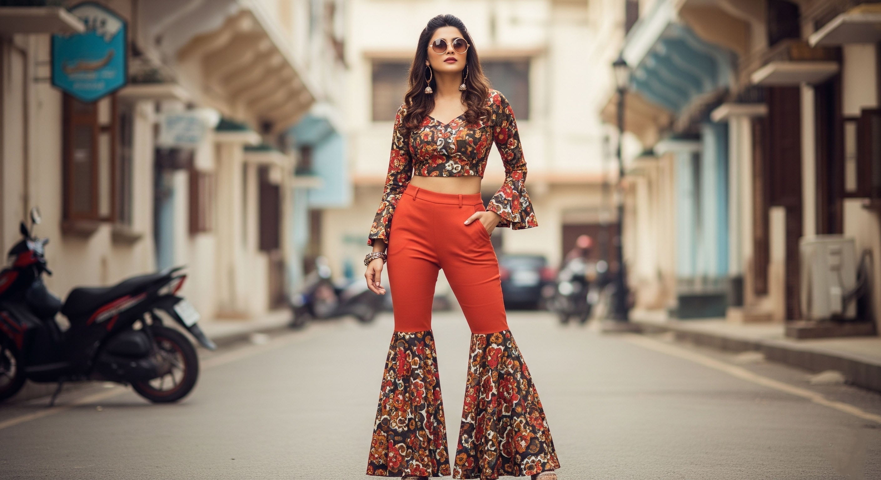 A stylish modern Indian woman wearing retro fusion fashion