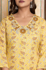 The Navra Yellow Floral Cotton Kurta Set with Embellished Neck