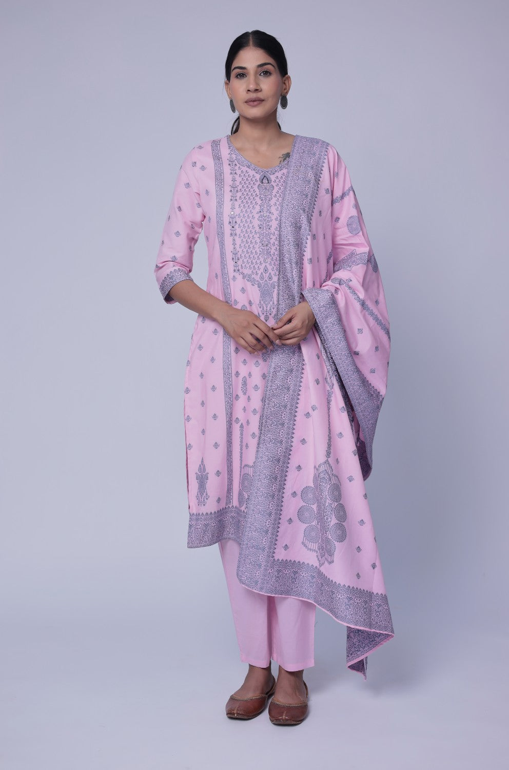 Model wearing an elegant baby pink cotton jacquard dupatta set from The Navra, featuring intricate grey merging embroidery on the front of the kurta and a matching patterned dupatta. Ideal for comfortable daily or semi-formal ethnic wear.