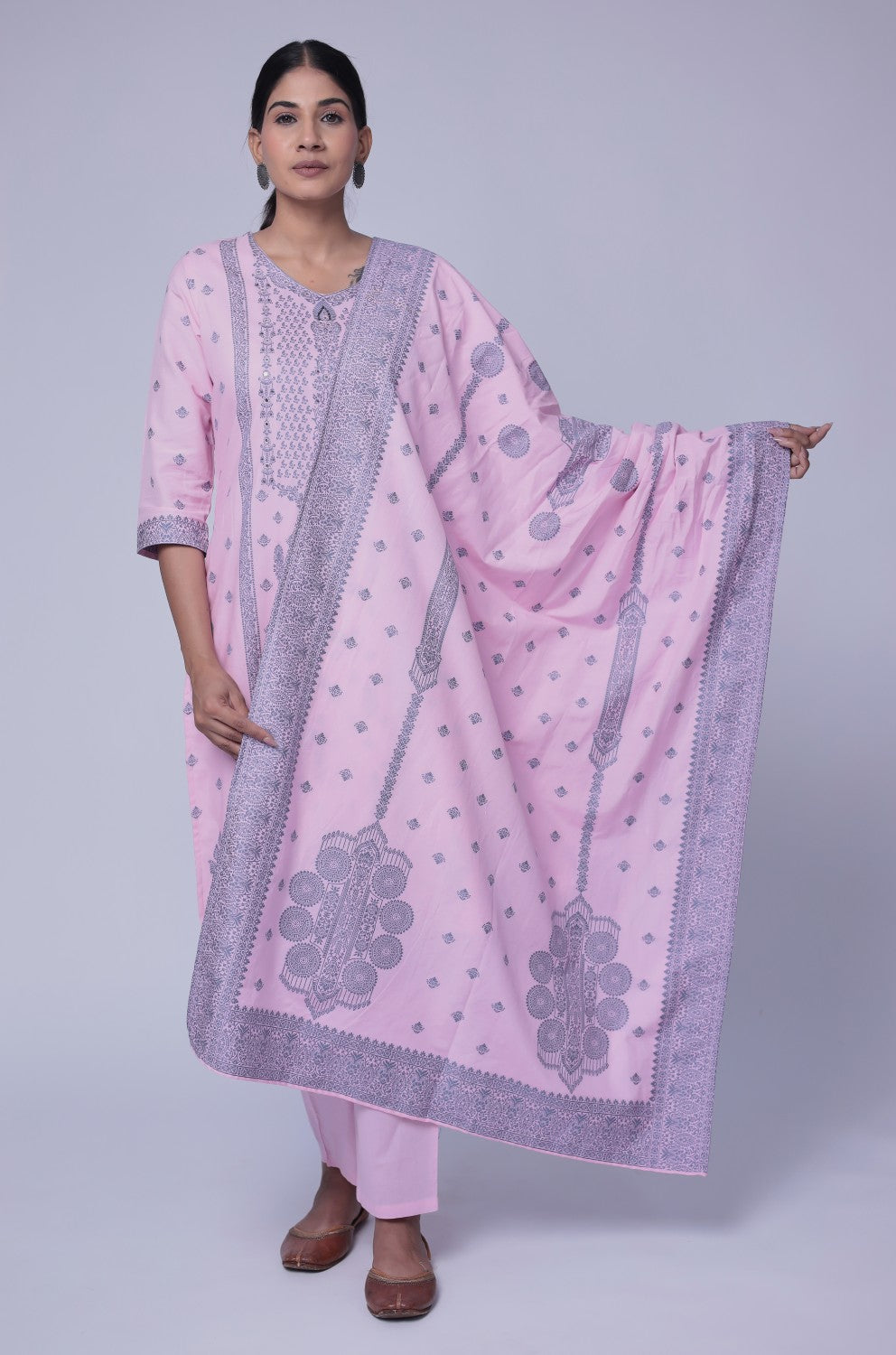Model in a dynamic pose, showcasing the comfortable movement and elegant silhouette of the baby pink cotton jacquard dupatta set.