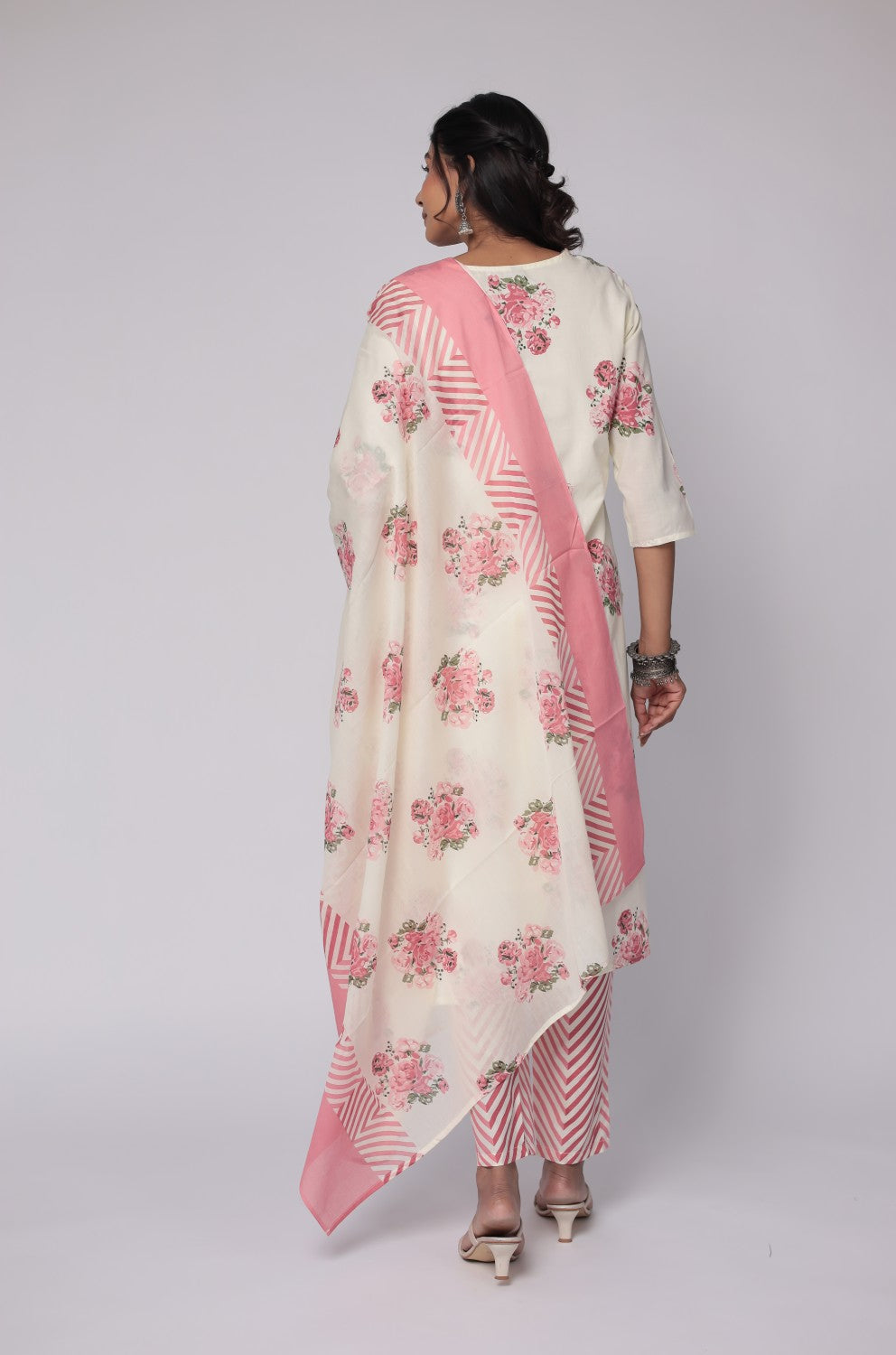Back view of the cream and red Jaipuri print dupatta set, showing the consistent floral pattern on the kurti and striped pants, with the mulmul dupatta.