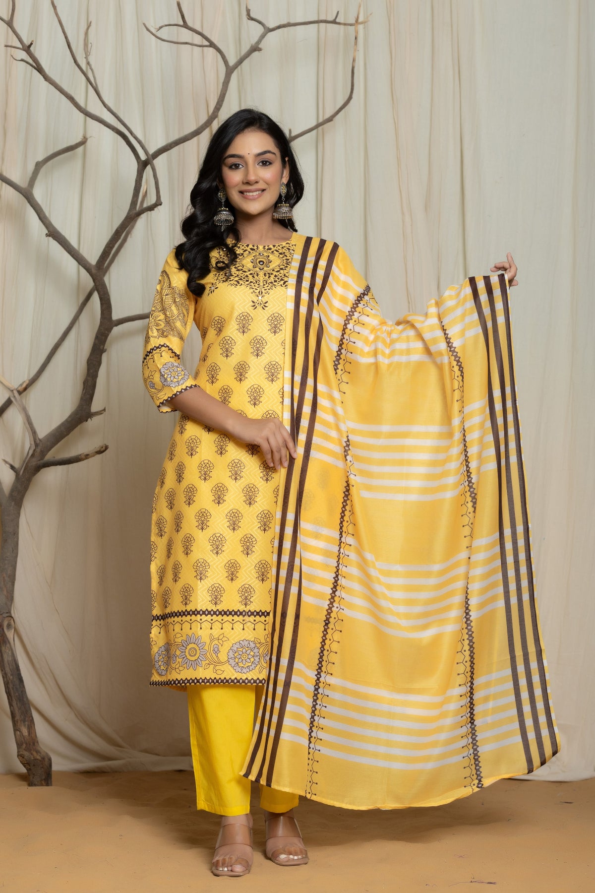 Back view of the elegant yellow Lapet fine digital print dupatta set, showing the consistent print pattern on the kurti and pants, with the matching patterned dupatta.