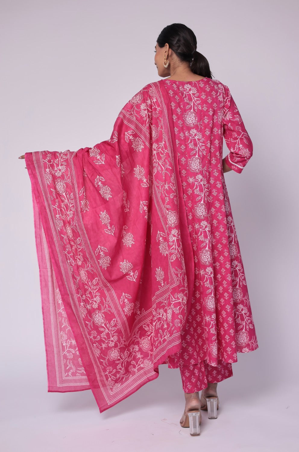Back view of the fuchsia pink cotton Anarkali Jaipuri print dupatta set, showing the consistent floral pattern on the kurti and comfortable silhouette.