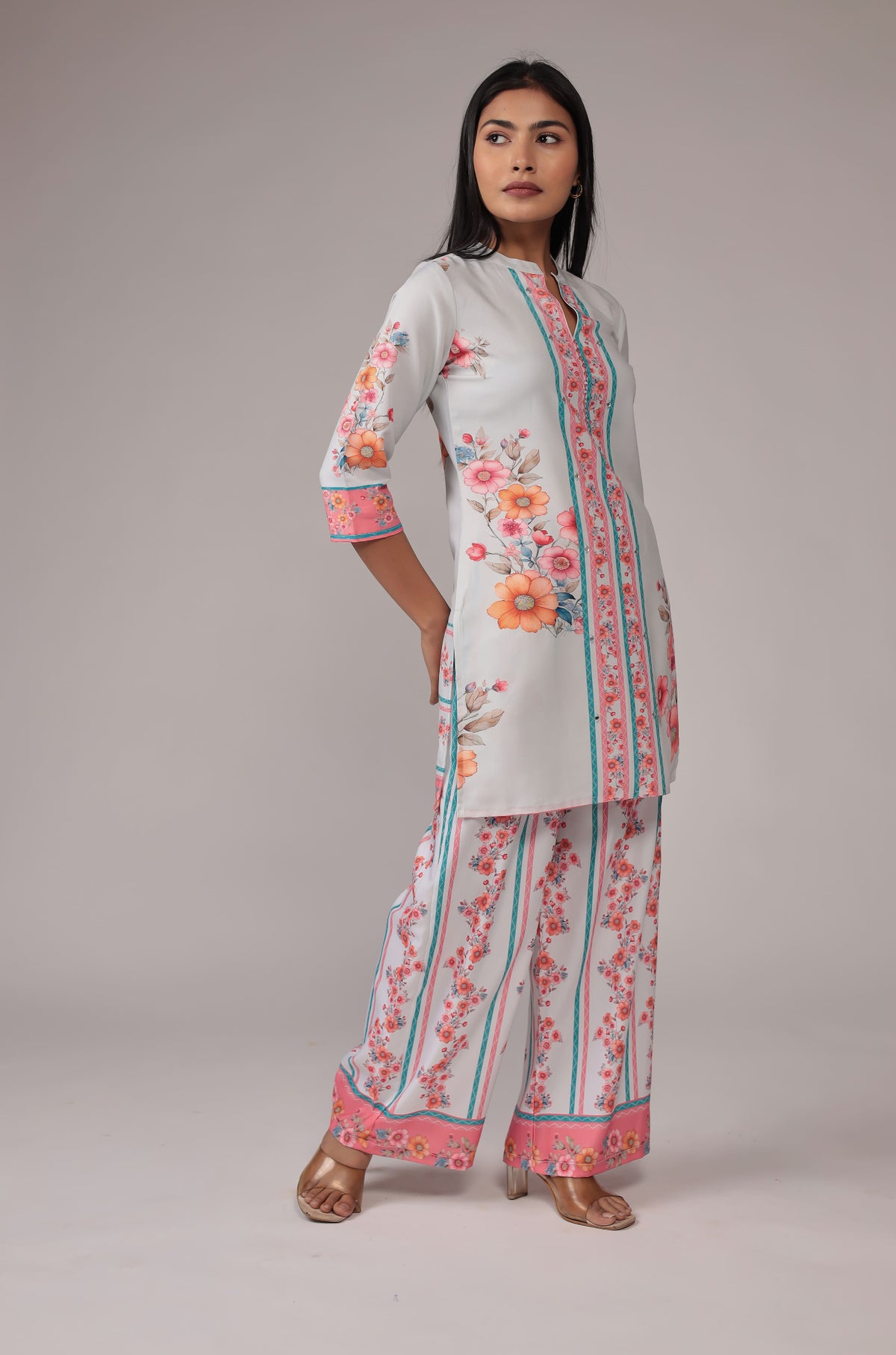 Model in a confident stance, highlighting the full length and overall beautiful design of the light grey digital print co-ord set.