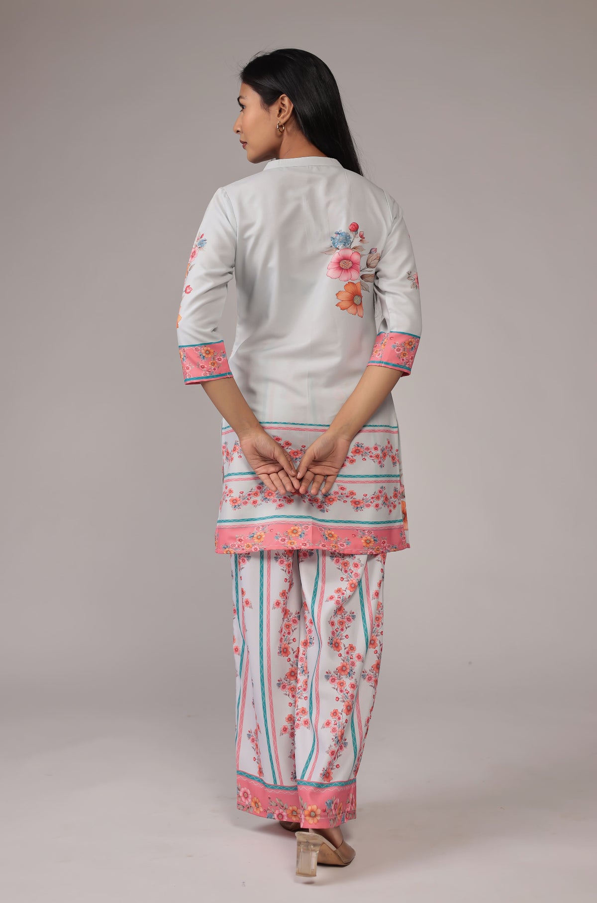 Back view of the beautiful light grey digital print co-ord set, showing the consistent floral pattern on the kurta and wide-leg pants.