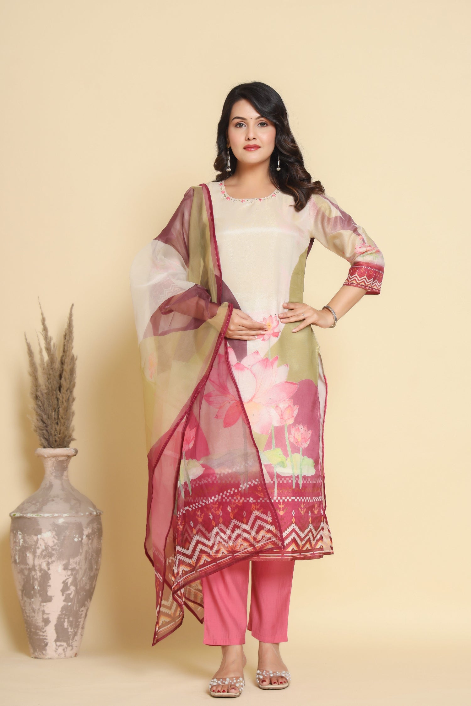 Model wearing a shimmer digital print dupatta set from The Navra, featuring a cream kurti with printed sleeves, a vibrant pink digital print dupatta, and matching pink silk pants. Ideal for contemporary ethnic wear.