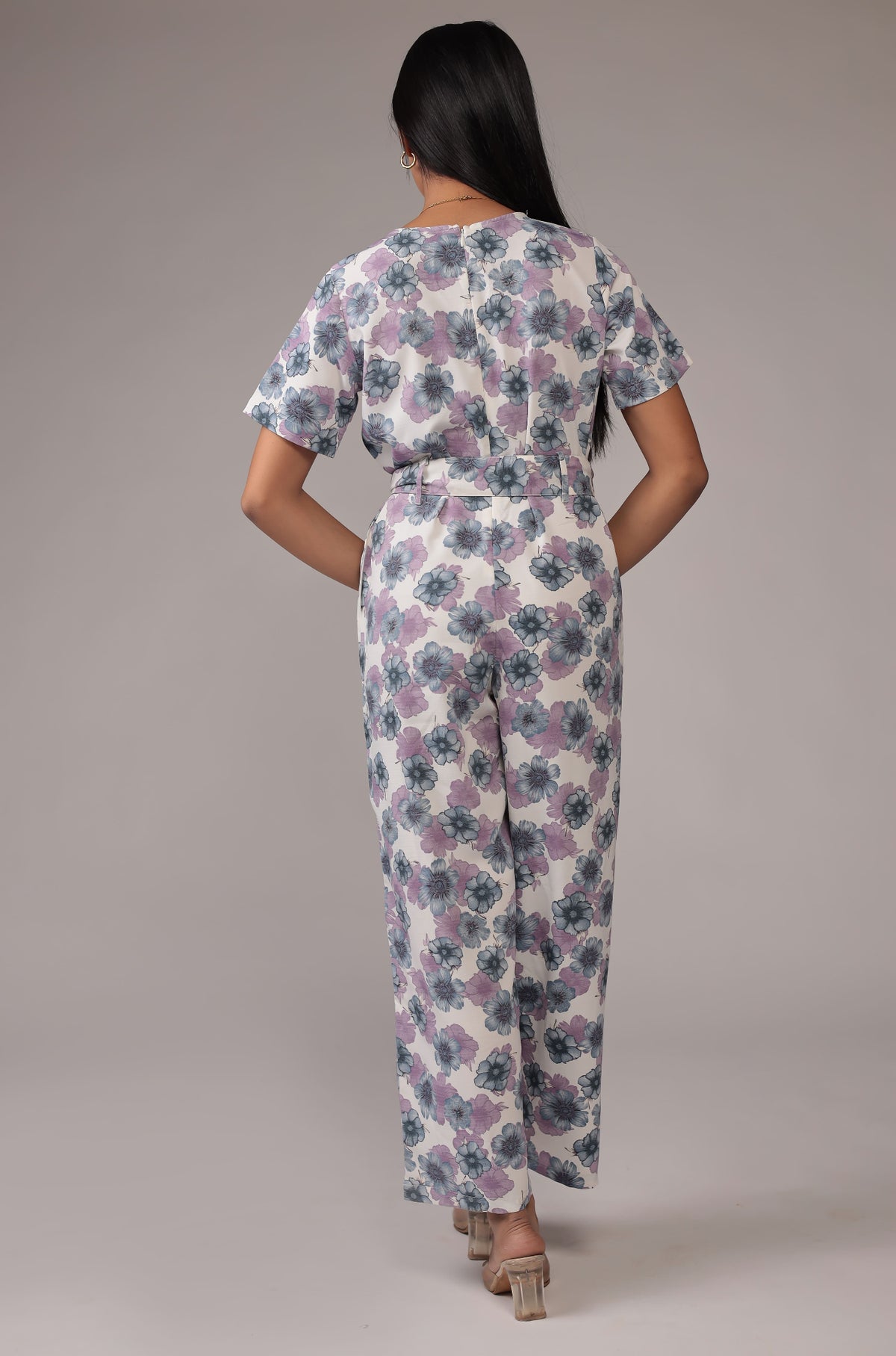 Back view of the beautiful white floral print coord set, showing the consistent pattern on the top and wide-leg pants.