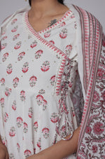 Back view of the white and red cotton Anarkali set, showing the consistent Jaipuri print on the kurta and pants, with crochet lace hem.