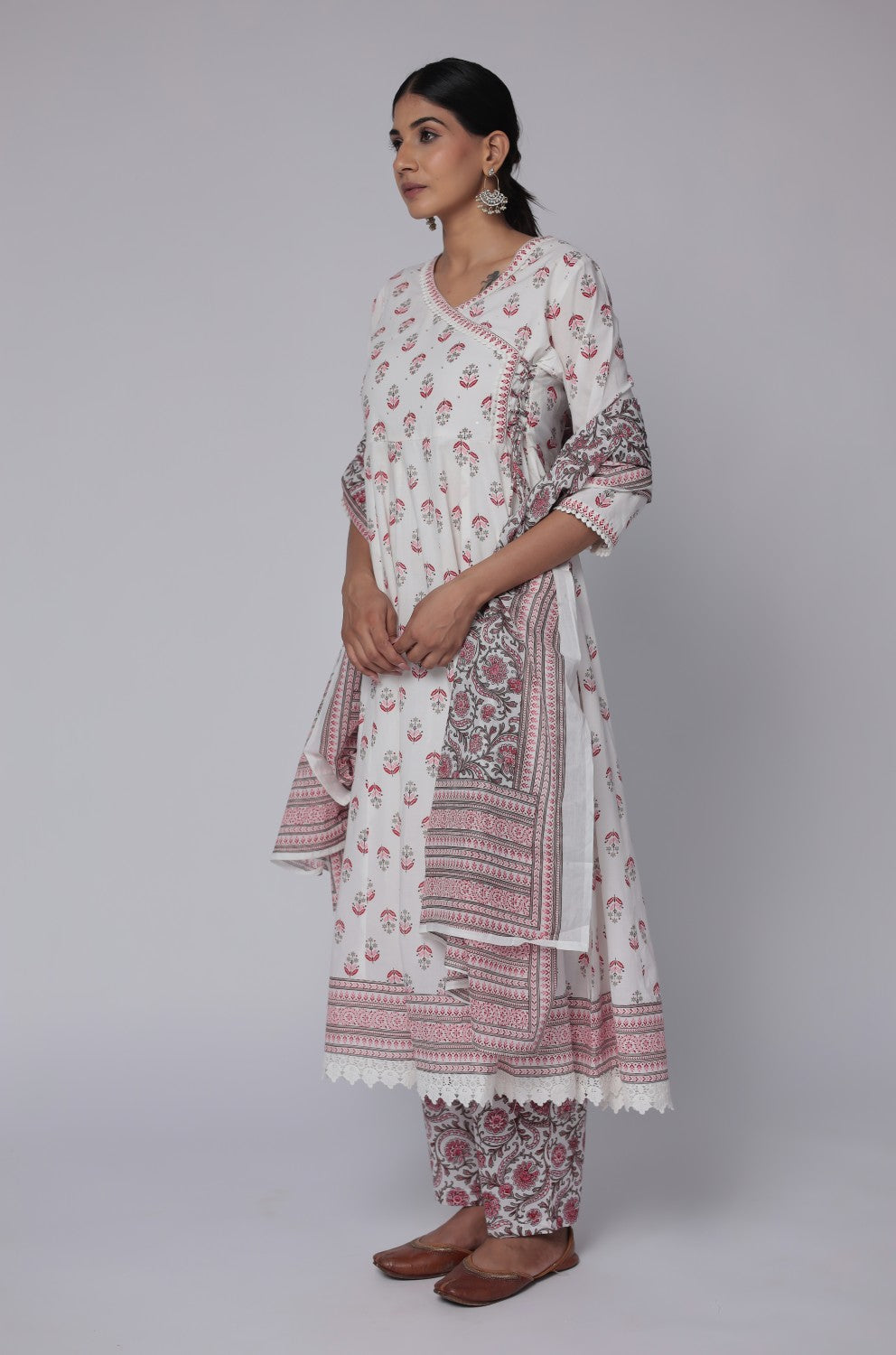 Model in a relaxed stance, highlighting the full length and comfortable design of the white and red cotton Anarkali set with Jaipuri print.