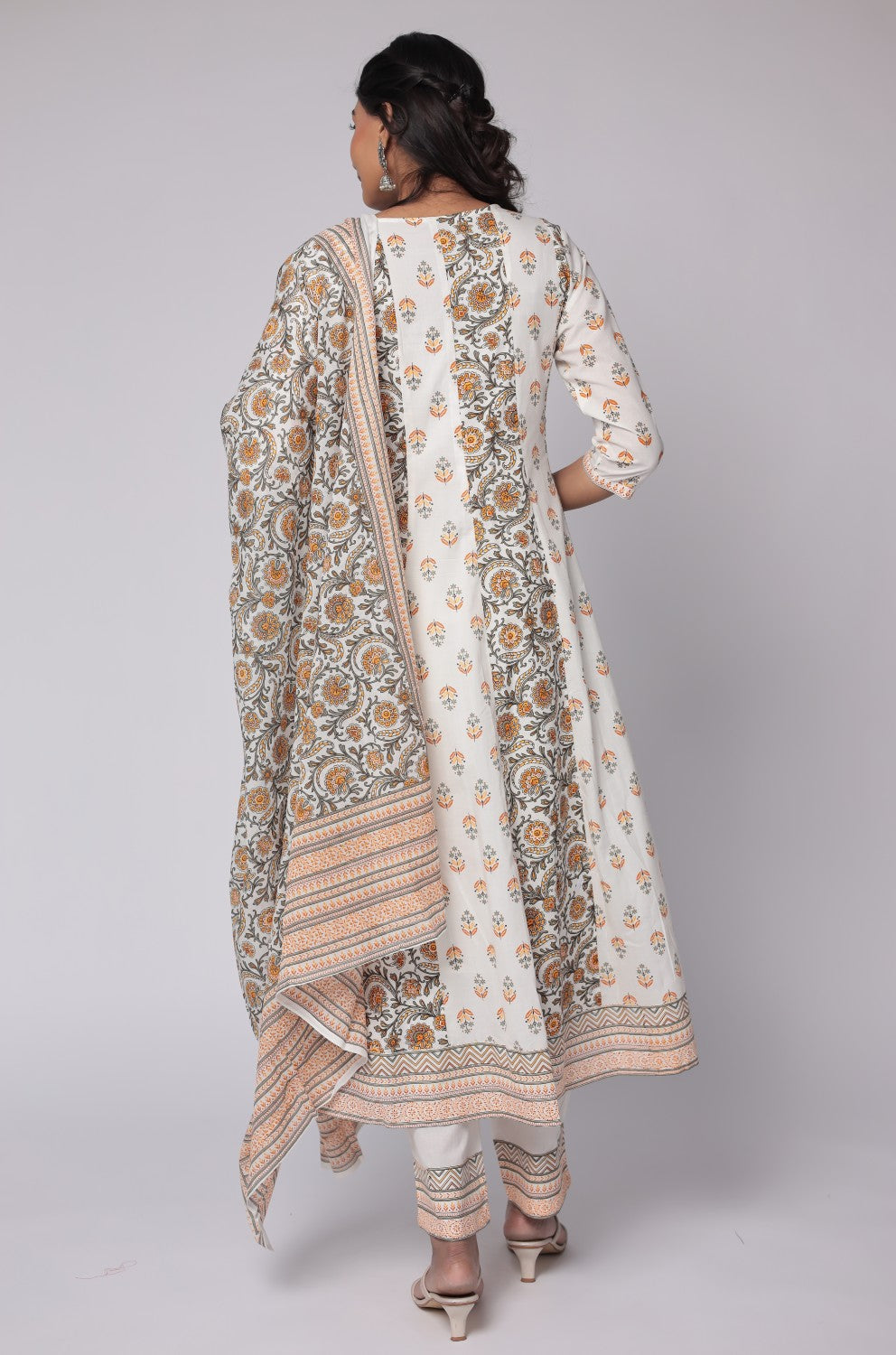 Back view of the white and yellow cotton Anarkali Jaipuri print dupatta set, showing the consistent floral pattern on the kurti and comfortable silhouette.