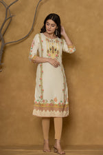 Model gracefully posing in the light yellow kurta with handwork, showcasing the comfortable movement and elegant style of the ethnic wear.