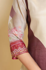 Detailed view of the vibrant digital print pattern on the sleeves of the cream kurti, showcasing the intricate design.