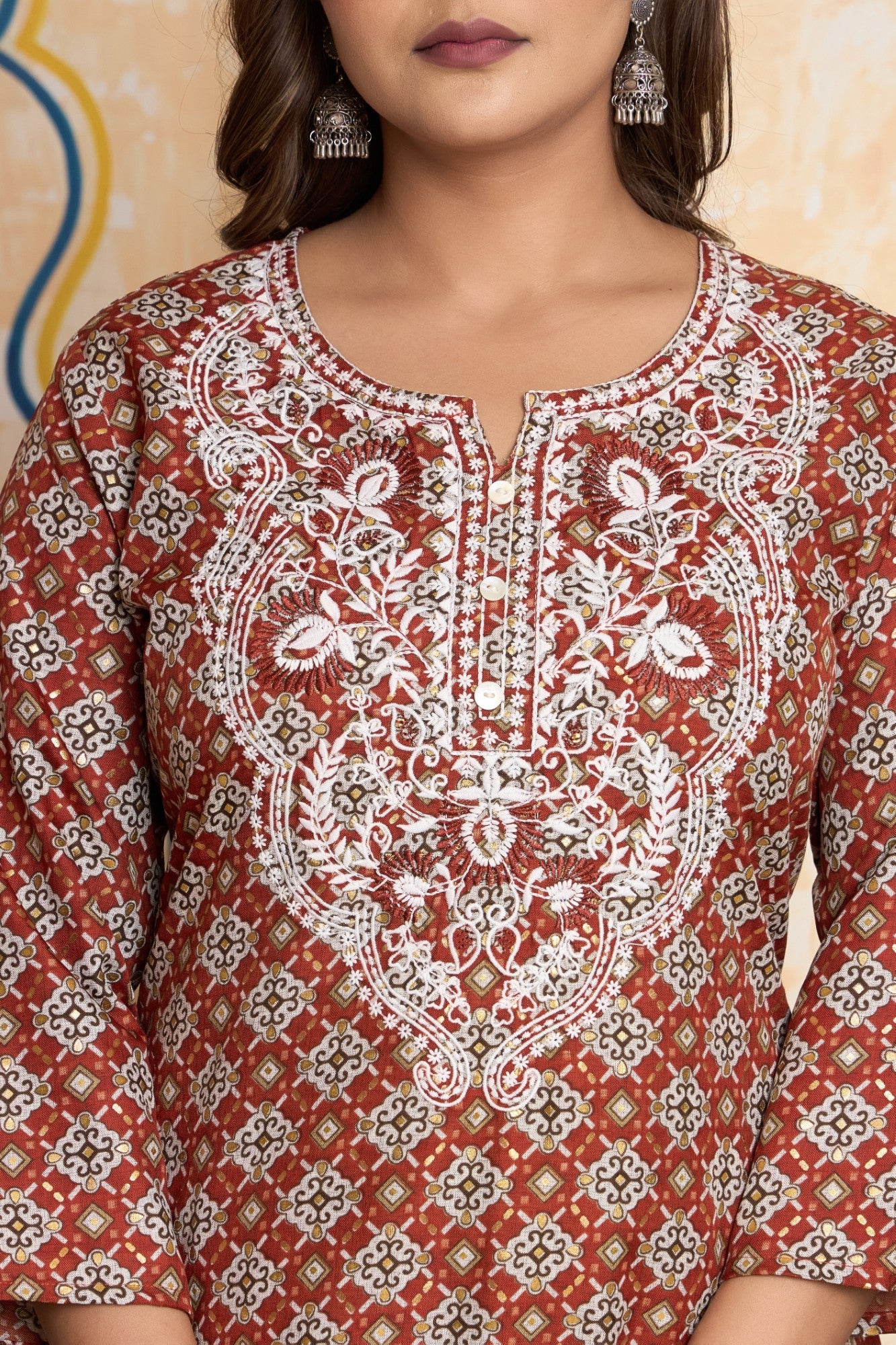 The Navra Brick Red Printed Cotton Kurta Set with Embroidery