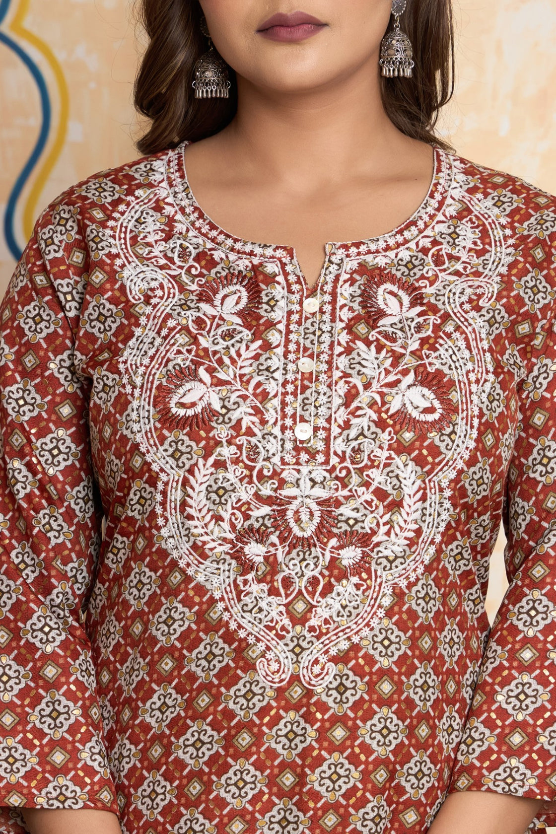 The Navra Brick Red Printed Cotton Kurta Set with Embroidery