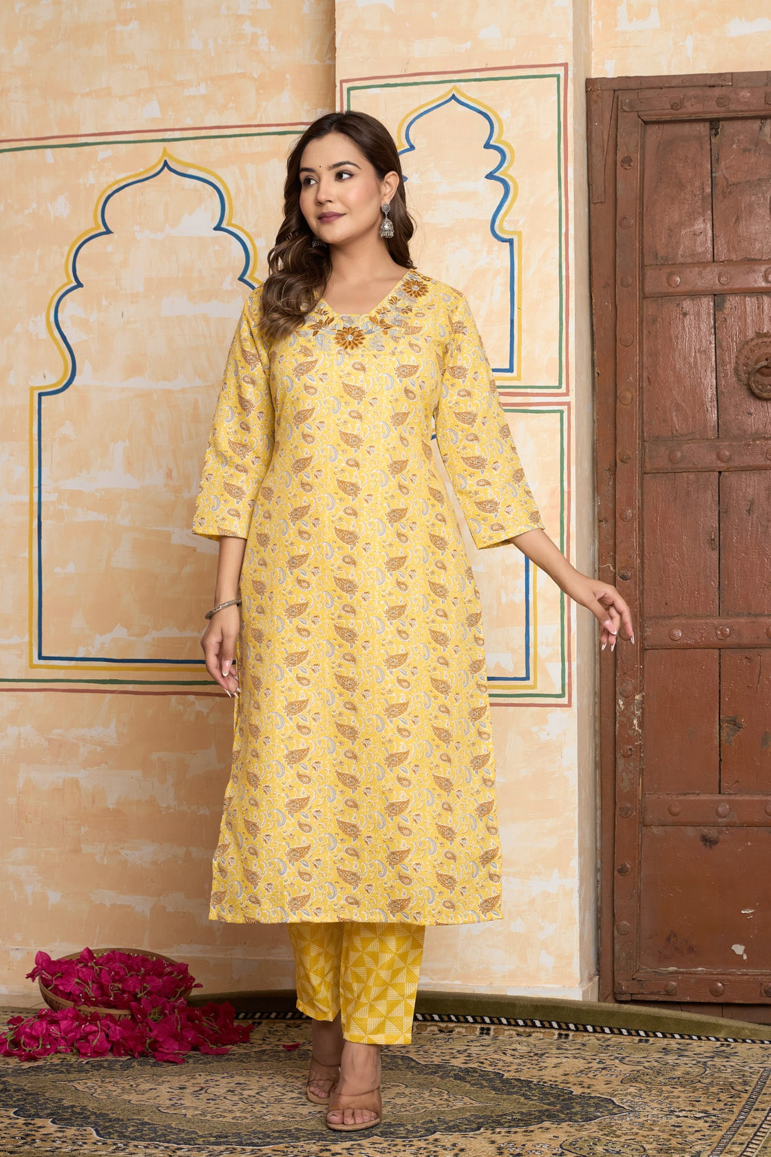 The Navra Yellow Floral Cotton Kurta Set with Embellished Neck