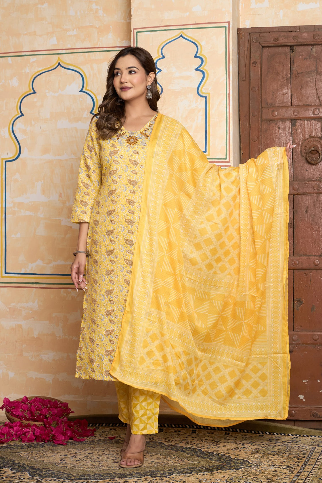 The Navra Yellow Floral Cotton Kurta Set with Embellished Neck