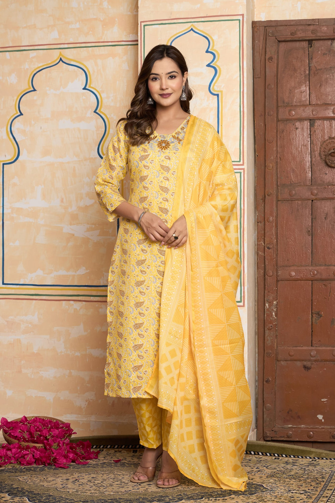 The Navra Yellow Floral Cotton Kurta Set with Embellished Neck