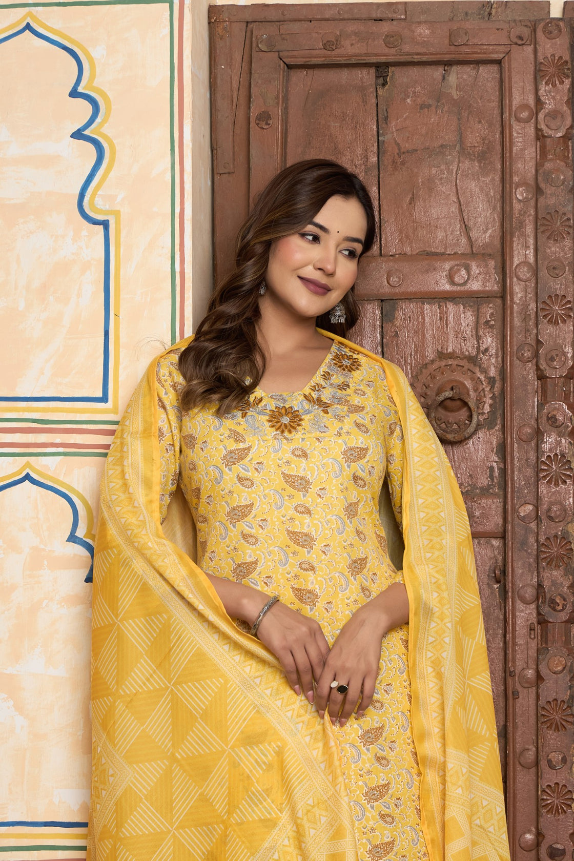 The Navra Yellow Floral Cotton Kurta Set with Embellished Neck