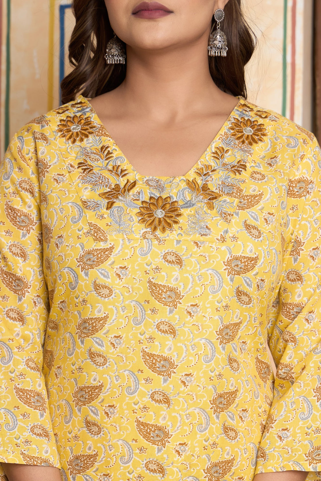 The Navra Yellow Floral Cotton Kurta Set with Embellished Neck