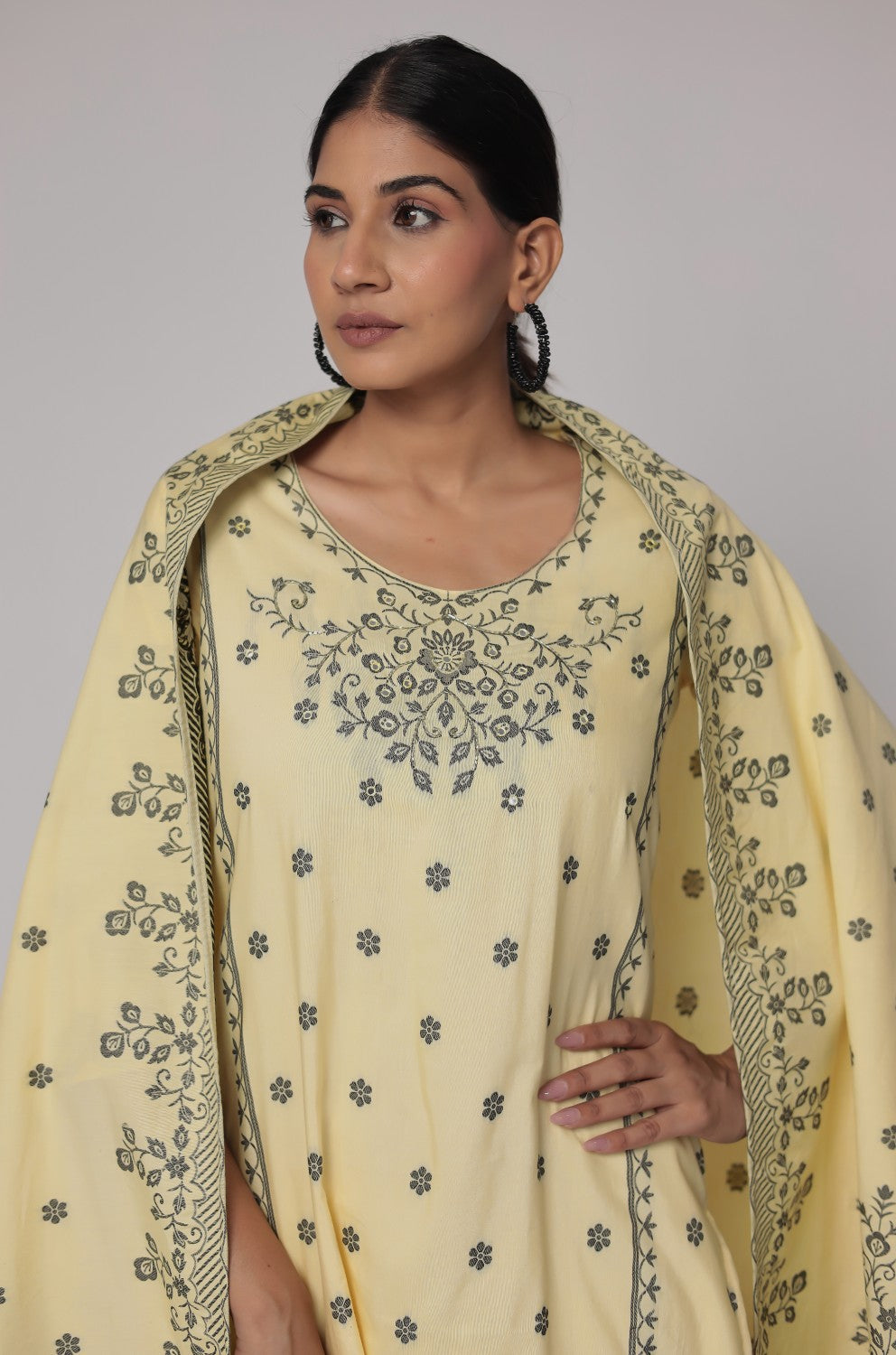 Cream Yellow cotton jacquard dupatta set detailed with merging embroidery on front