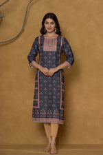 Back view of the black kurta, showing the consistent patterned design and comfortable silhouette.