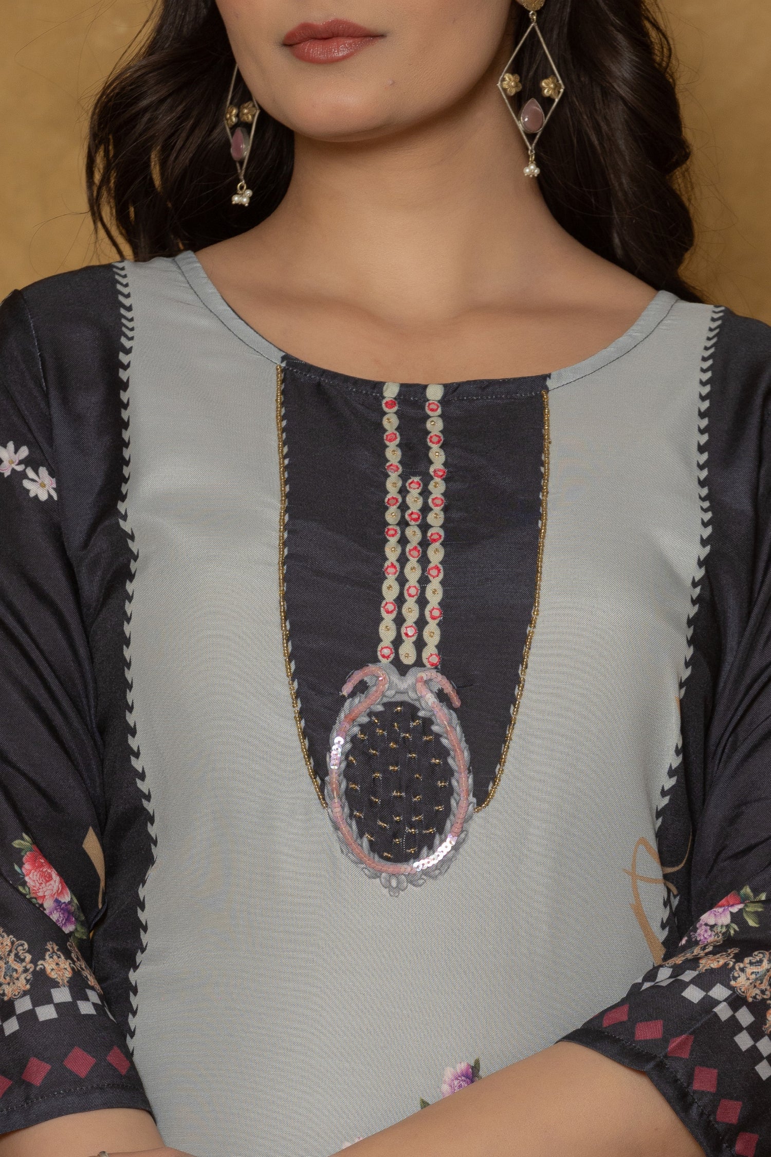 Close-up of the delicate handwork embroidery and detailing on the neckline of the black pannel kurta, highlighting fine craftsmanship.