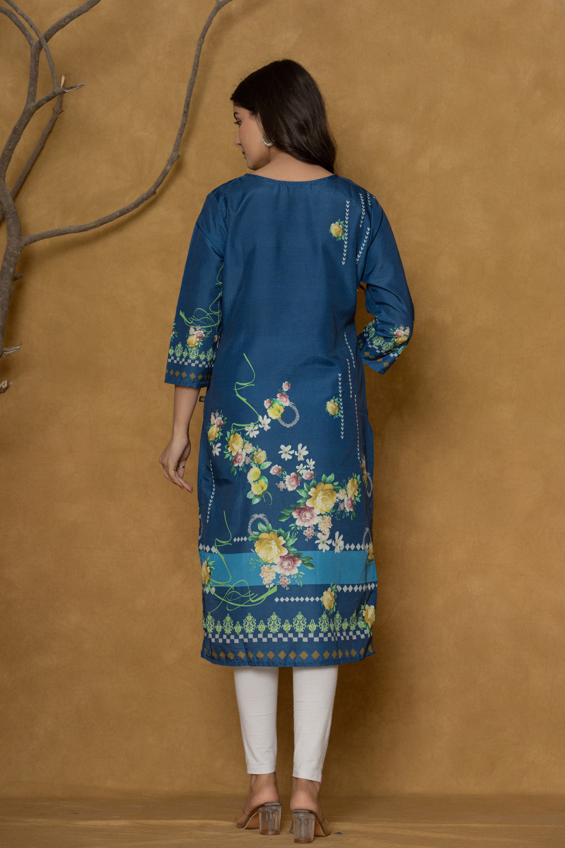 Back view of the blue kurta, showing the consistent floral print and comfortable silhouette.