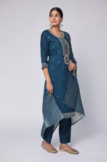 Back view of the blue soft silk suit set, showing the elegant drape of the kurta and printed jacquard dupatta.