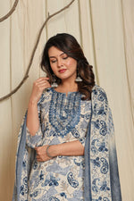 Side profile of model showcasing the comfortable fit and elegant drape of the premium cotton floral printed kurta set with dupatta.