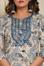 Close-up of the intricate blue and white floral print and detailing on the neckline of the premium cotton kurta, highlighting the design details.