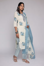 Model in a confident stance, highlighting the full length and vibrant Jaipuri print design of the cream and blue kurta set.