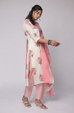 Model gracefully posing in the cream and red Jaipuri print dupatta set, showcasing the comfortable movement and elegant flow of the mulmul dupatta.