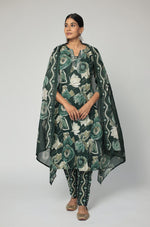 Model wearing a vibrant dark green Jaipuri print dupatta set from The Navra, featuring intricate handwork and beads work on the neckline of the kurta, and a matching printed dupatta. Ideal for comfortable daily or casual ethnic wear.