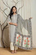 Side profile of model showcasing the comfortable fit and elegant drape of the English grey digital print dupatta set with handwork and flowing dupatta.