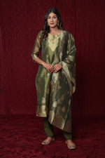 Close-up of the sheer yet rich texture of the jacquard organza fabric on the kurti and dupatta, alongside the smooth feel of the soft silk pant, highlighting material quality.