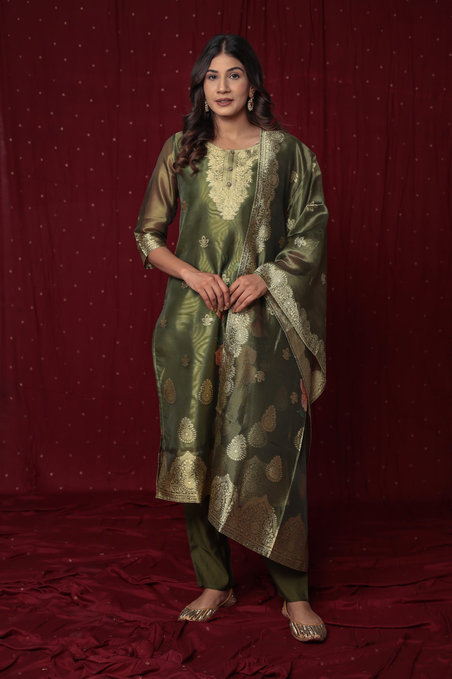 Close-up of the sheer yet rich texture of the jacquard organza fabric on the kurti and dupatta, alongside the smooth feel of the soft silk pant, highlighting material quality.