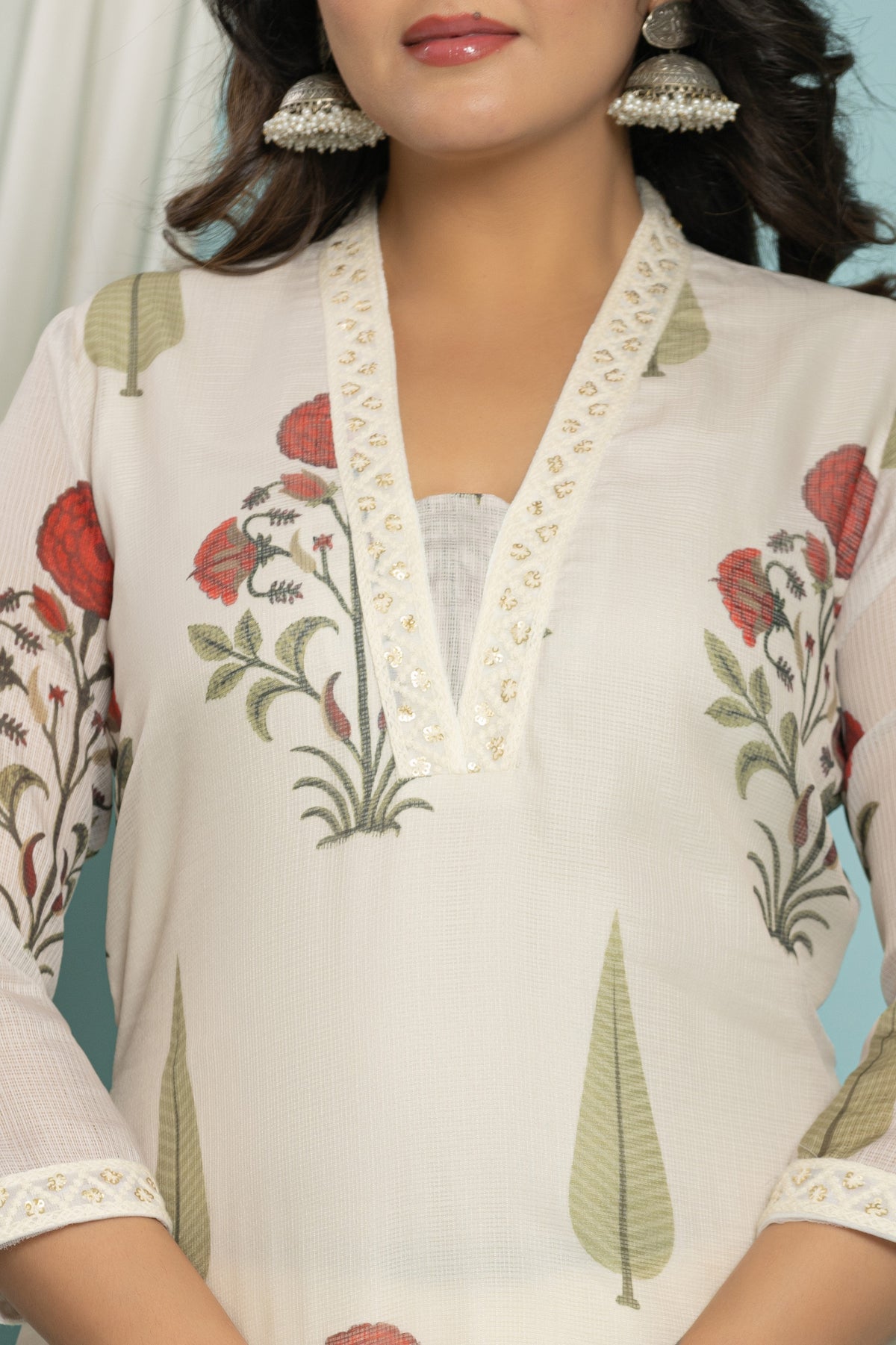 Detailed view of the sheer Kota Doria dupatta with matching floral print and elegant border design, from The Navra ethnic wear.