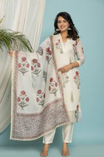 Model wearing white Kota Doria dupatta set from The Navra, featuring a floral print kurti and matching dupatta, with soft silk pants. Ideal for casual or daily wear.