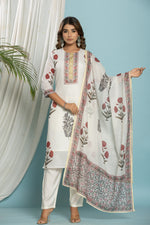 Model wearing off-white Kota Doria dupatta set from The Navra, featuring a red and black floral print kurti, matching dupatta, and soft silk pants. Ideal for casual or everyday ethnic wear.