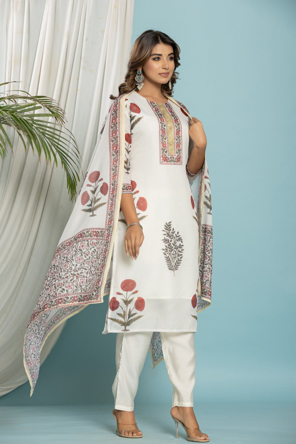 Flat lay arrangement of the complete Kota Doria dupatta set, including the floral printed kurti, matching dupatta, and soft silk pant.