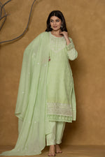 Model in a confident stance, highlighting the full length and overall elegant design of the premium 100% cotton Chifley dupatta set in light green.