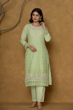 Back view of the premium cotton Chifley dupatta set in light green, showing the comfortable silhouette of the kurti and pants.