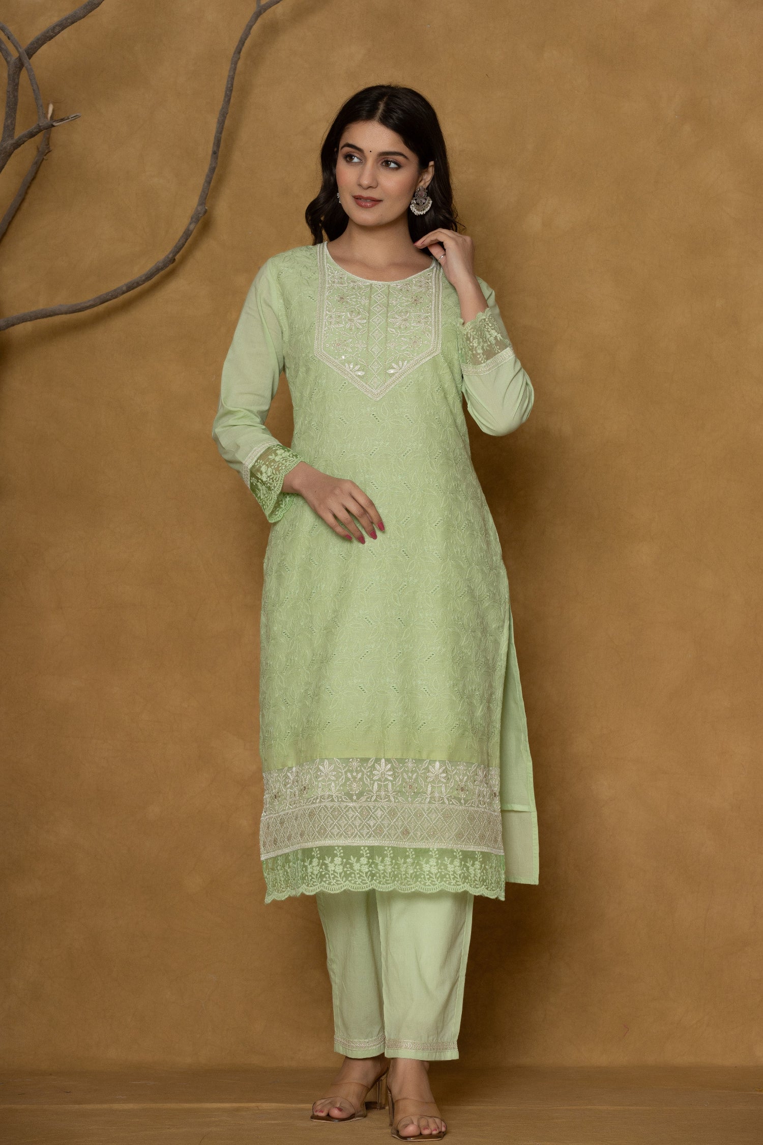 Back view of the premium cotton Chifley dupatta set in light green, showing the comfortable silhouette of the kurti and pants.