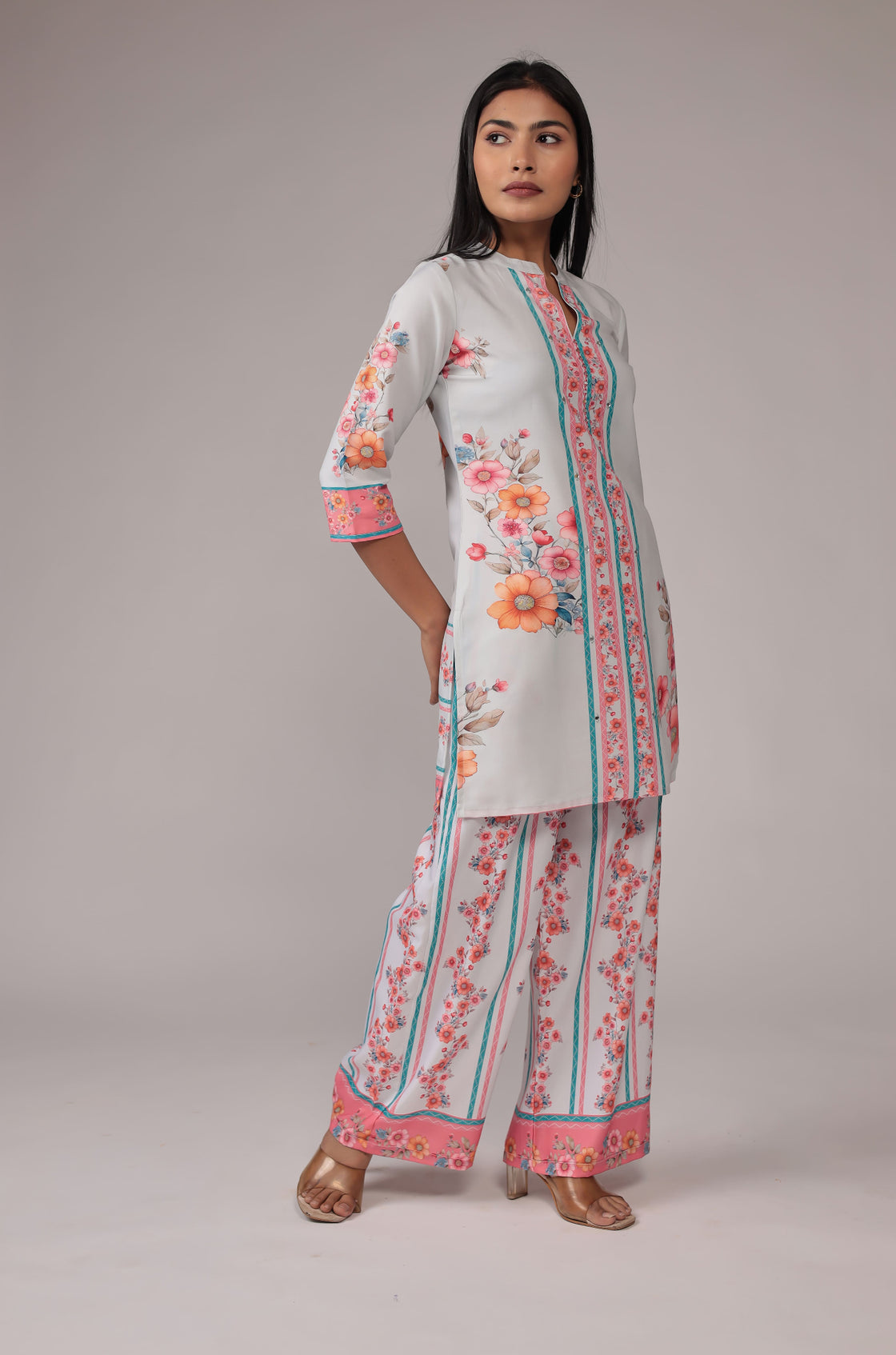 Model in a confident stance, highlighting the full length and overall beautiful design of the light grey digital print co-ord set.