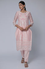 Model in a confident stance, highlighting the full length and overall elegant design of the light peach Chanderi dupatta set.