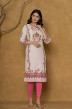 Model gracefully posing in the light pink kurta with handwork, showcasing the comfortable movement and elegant style of the ethnic wear.