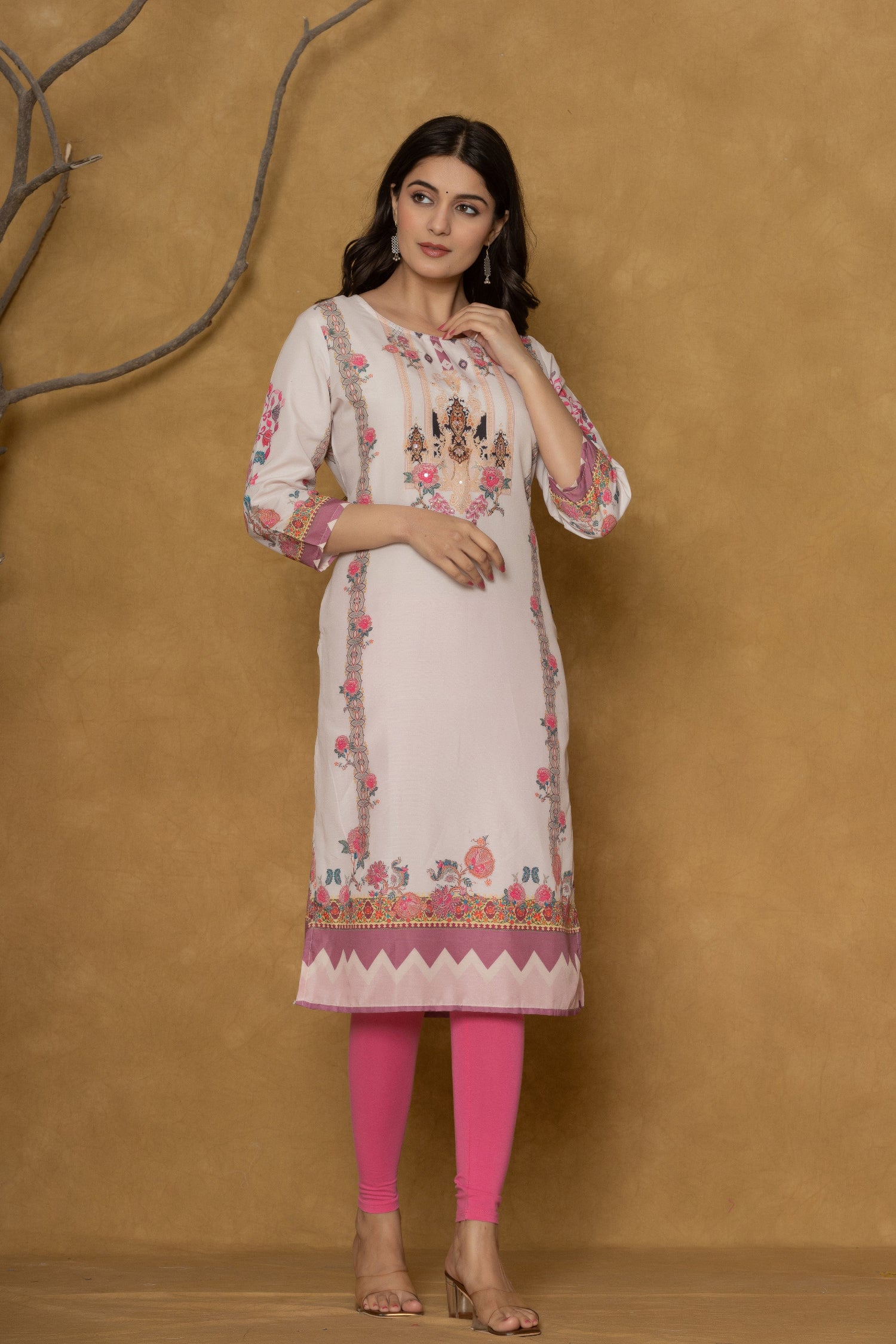 Model gracefully posing in the light pink kurta with handwork, showcasing the comfortable movement and elegant style of the ethnic wear.
