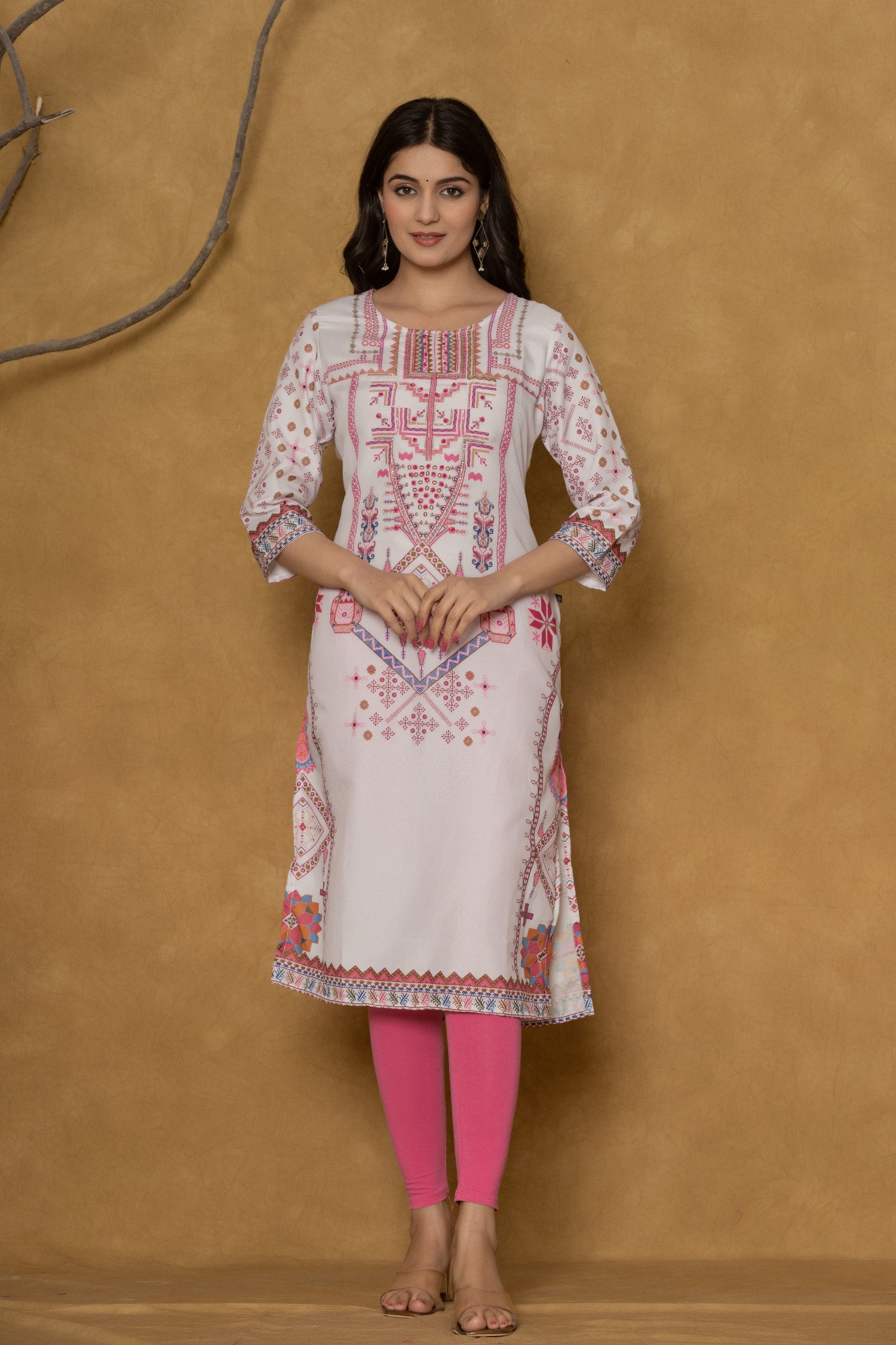 Close-up of the delicate patterns along the hemline of the light purple pannel kurta, showcasing the fabric texture and design detail.

