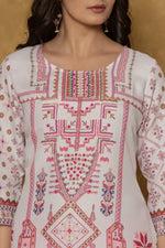 Close-up of the beautiful handwork embroidery and detailing on the round neckline of the light purple pannel kurta, highlighting craftsmanship.