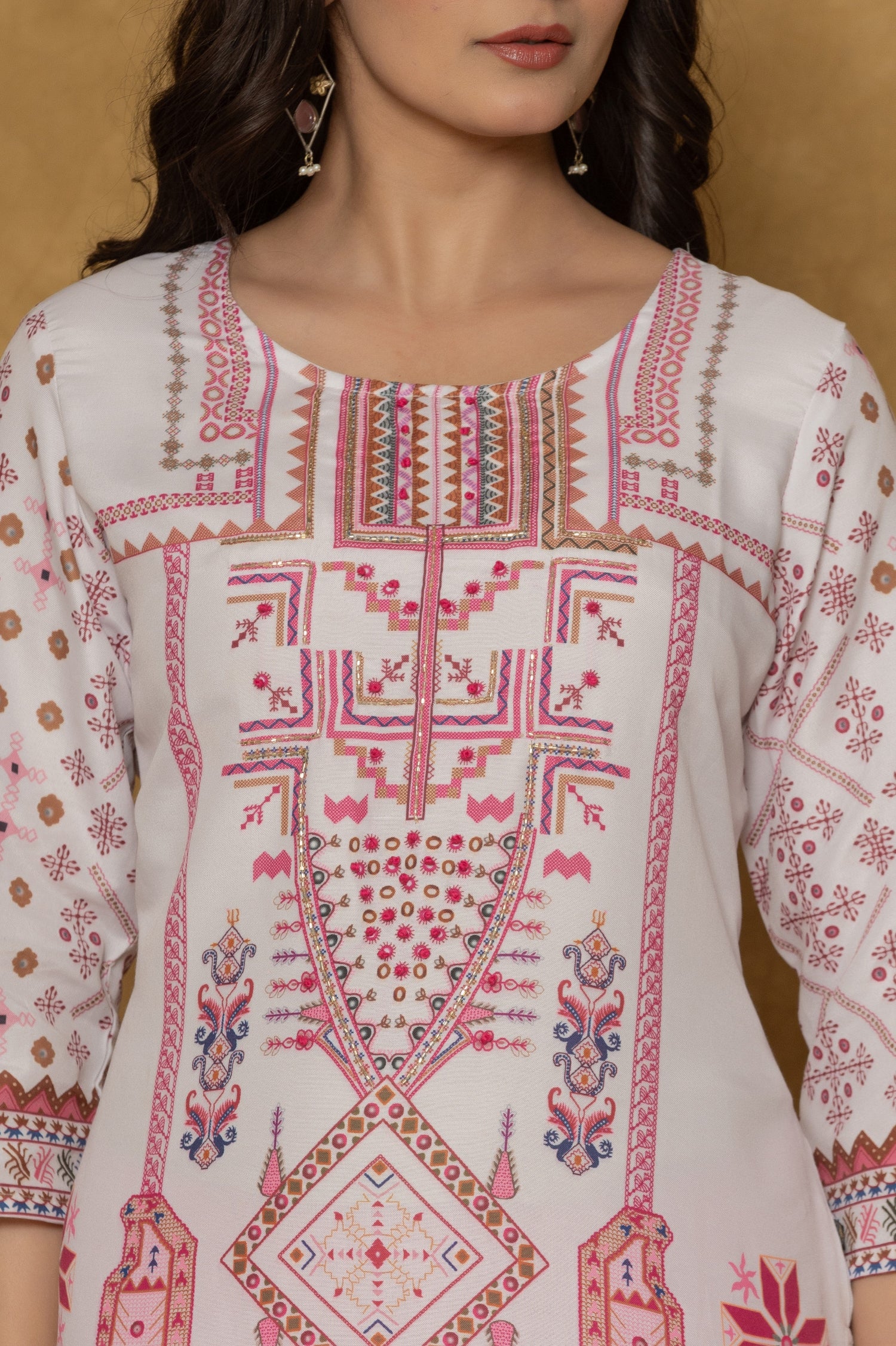 Close-up of the beautiful handwork embroidery and detailing on the round neckline of the light purple pannel kurta, highlighting craftsmanship.